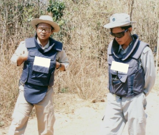wearing industrial safety specs and sunglasses